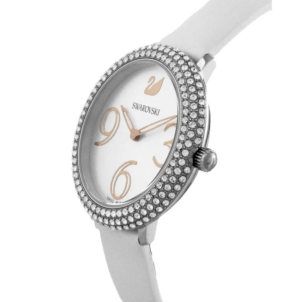 Angled view of Swarovski Crystal Frost watch showing crystal-embellished bezel and white strap