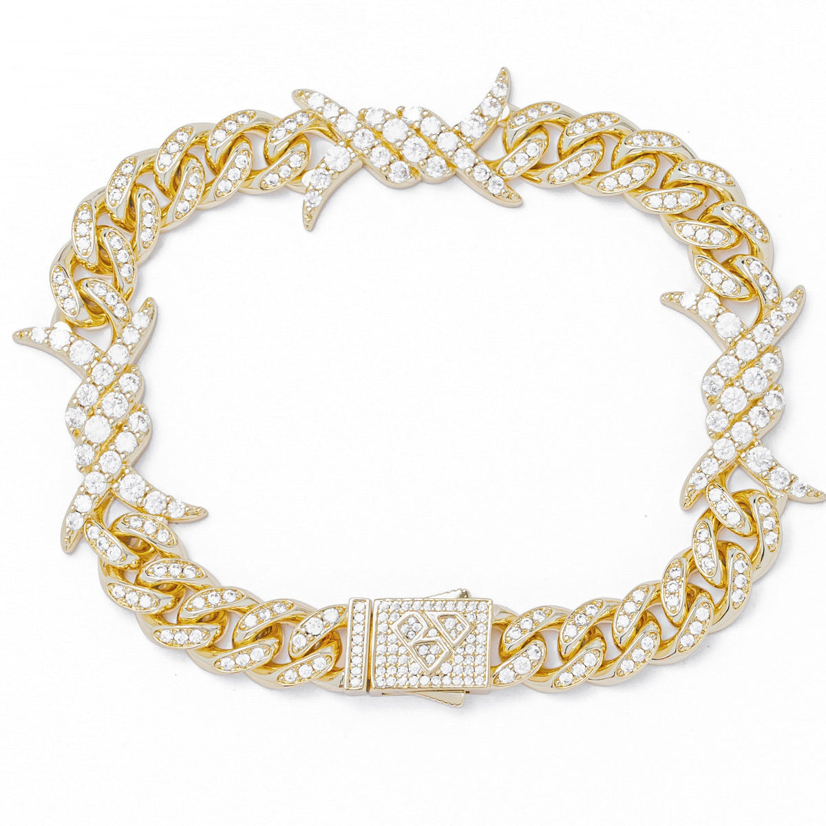 Gold 10MM curb chain bracelet with spiked horns and cubic zirconia stones, front view