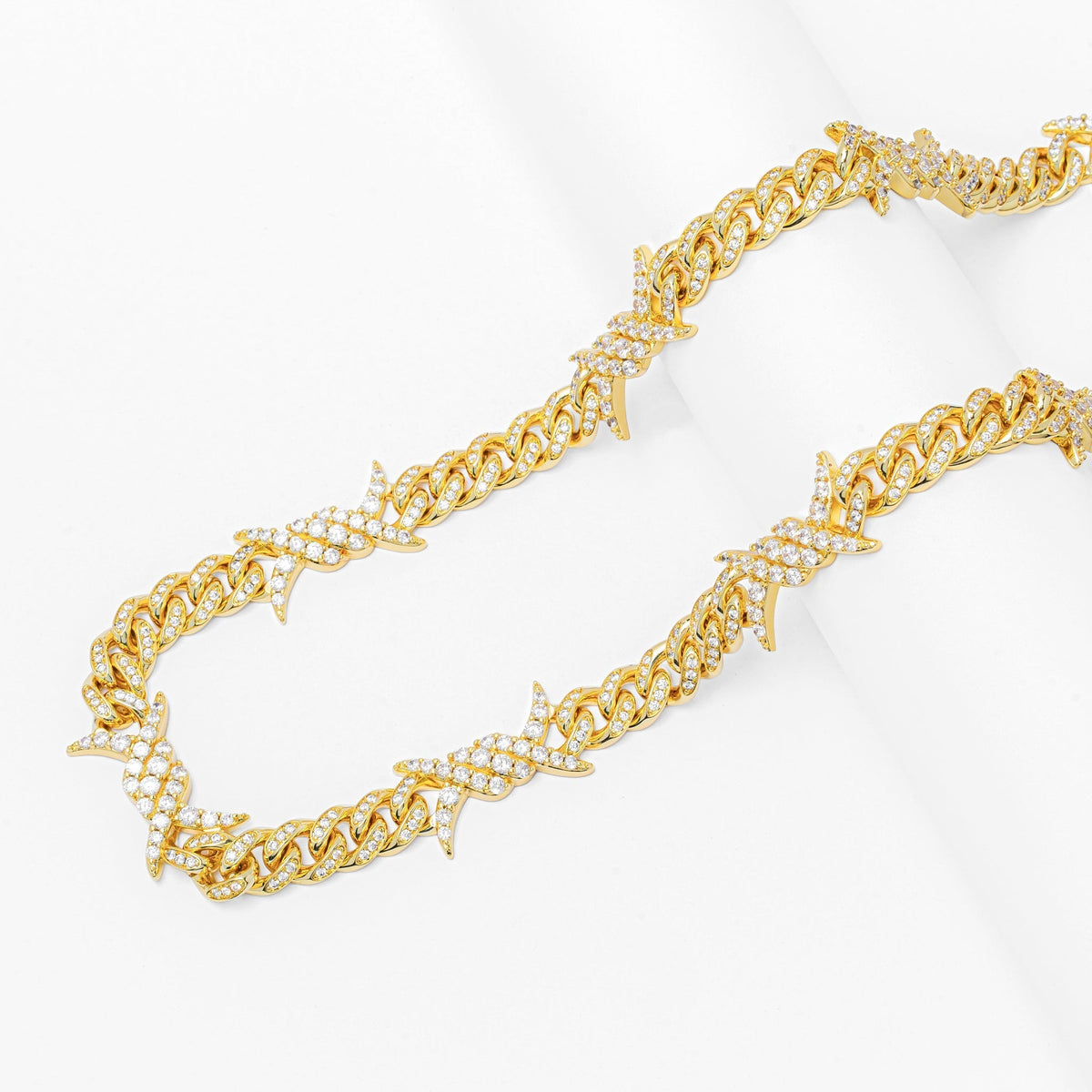 Full length view of Big Daddy spiked horns gold chain necklace