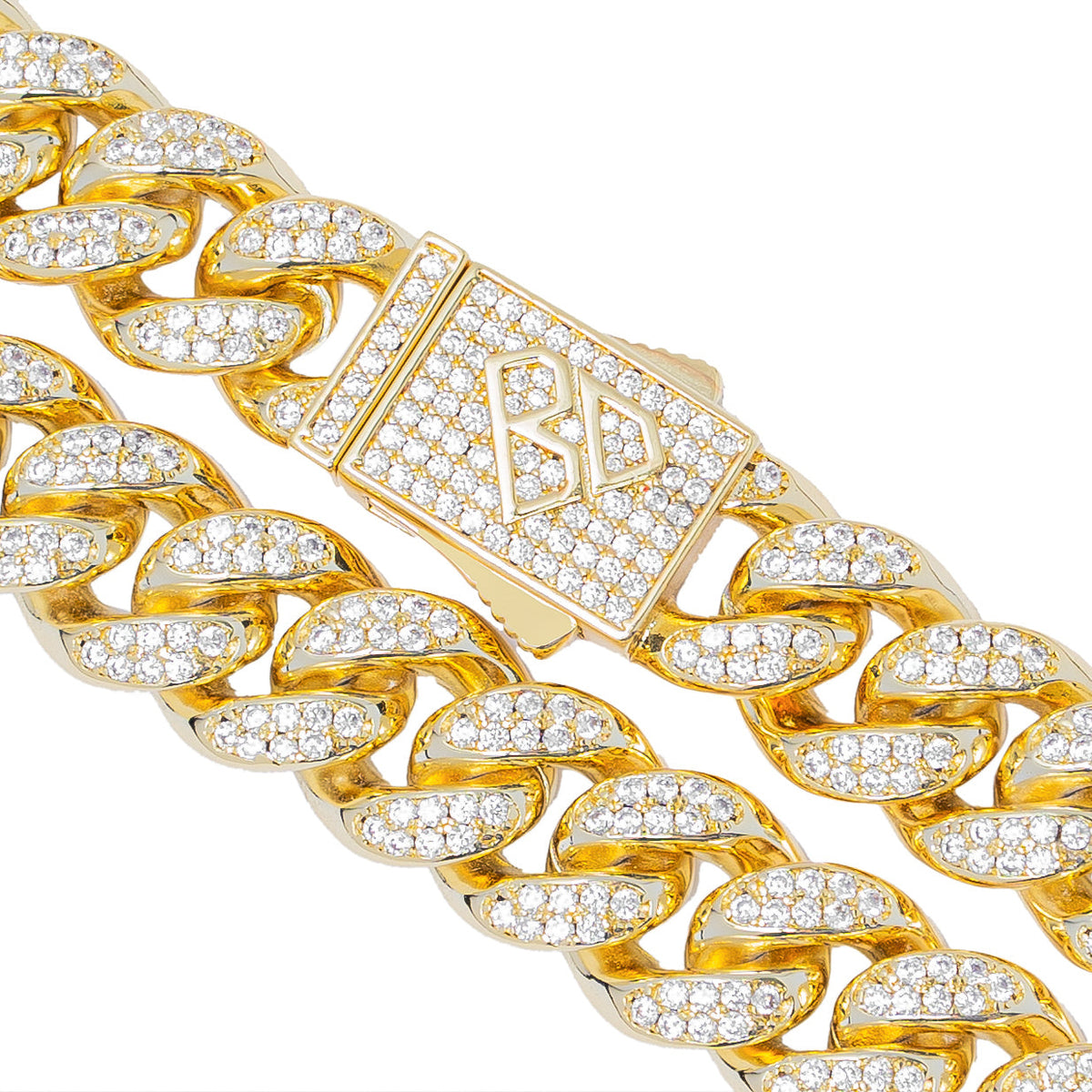 Close-up of diamond iced out links and gold clasp detail