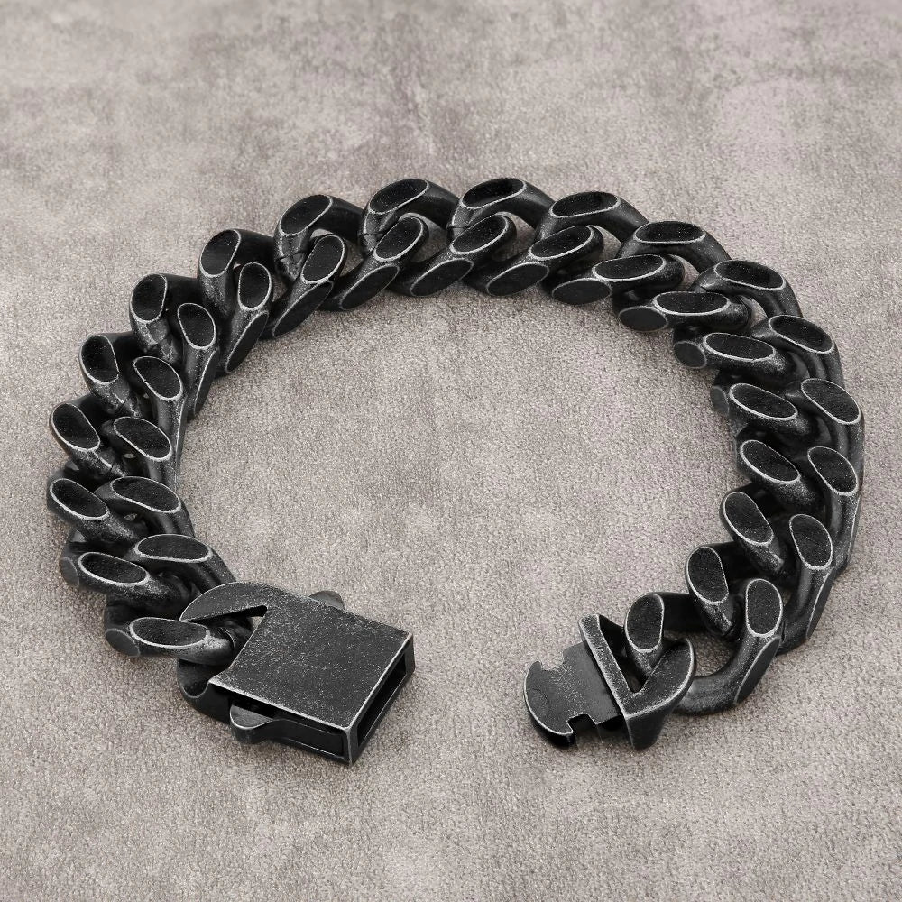 14mm all-black Cuban curb link bracelet laid flat showing link details
