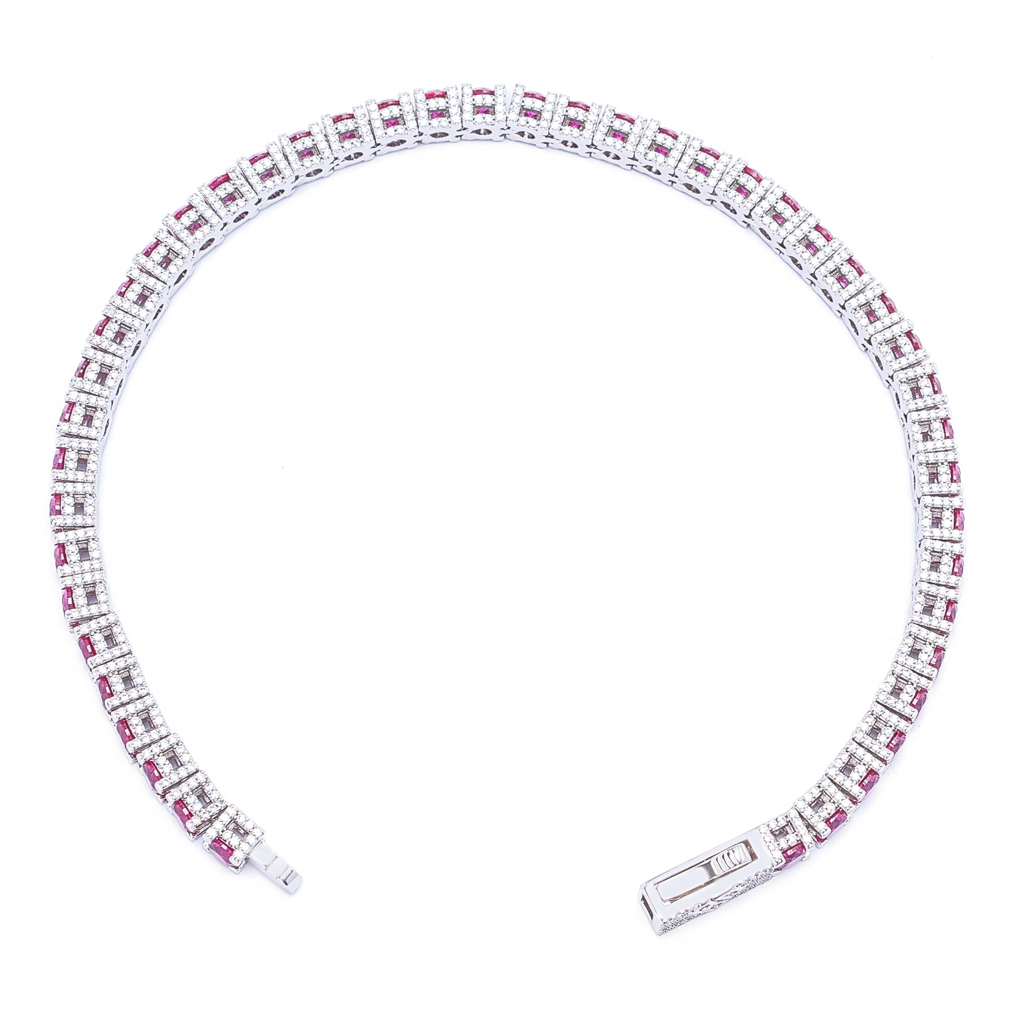 Silver ruby tennis bracelet from above displaying full circular layout with square ruby links