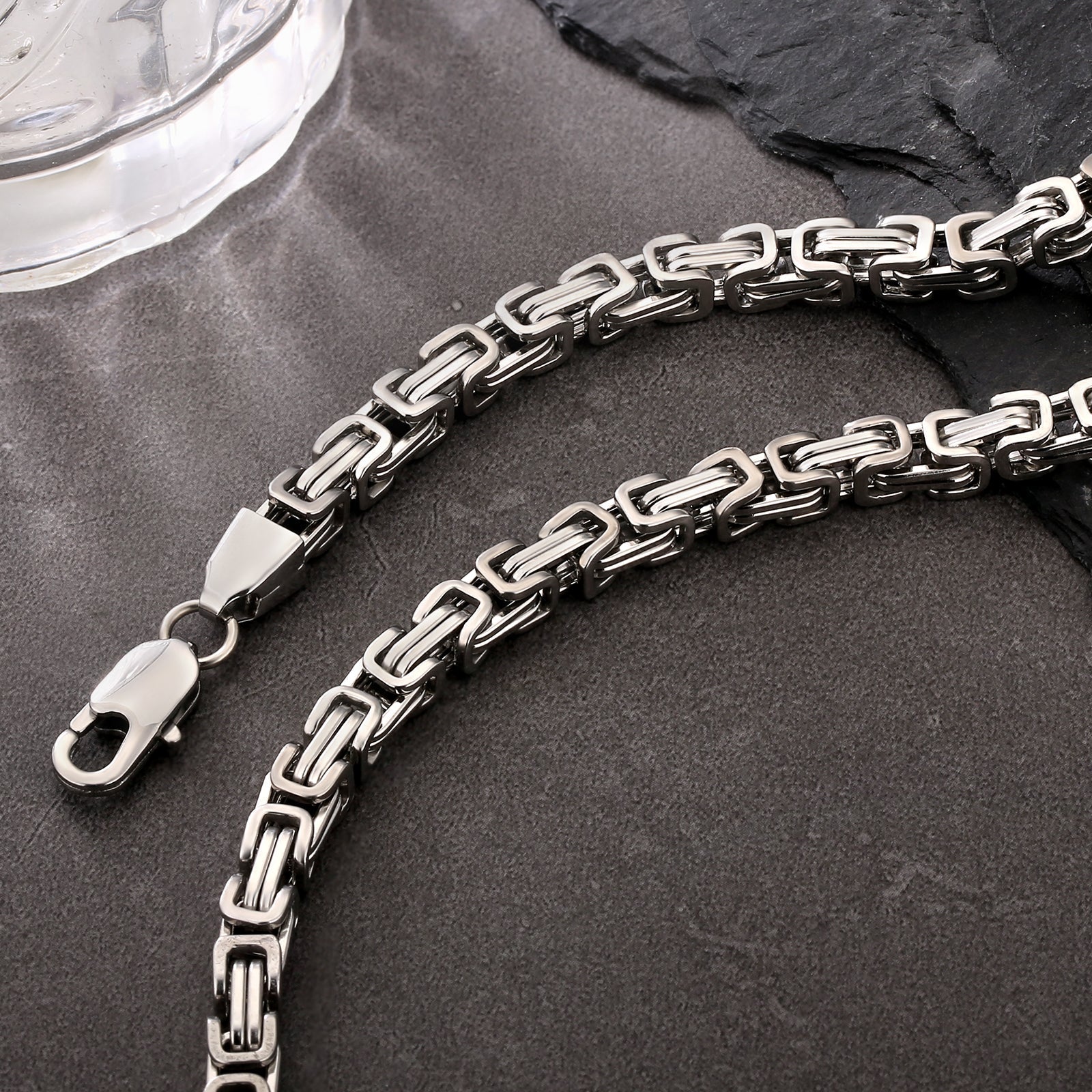 Close-up detail of 5mm Byzantine chain links and lobster clasp clasp