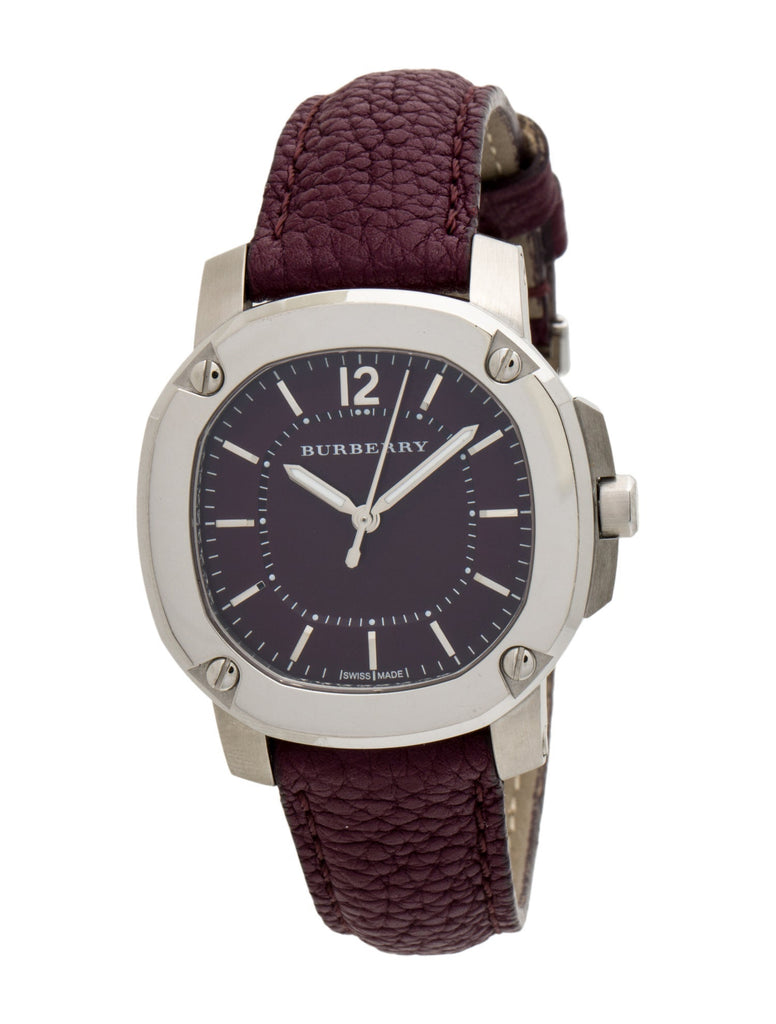 Angled view of Burberry The Britain BBY1714 showing maroon dial and leather strap