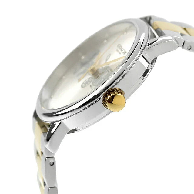 Side view of Coach watch showing 2-tone bracelet and gold-tone crown detail