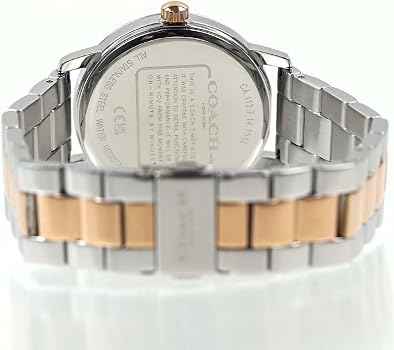 Coach Grand Carriage caseback showing engraved text and two-tone stainless steel construction
