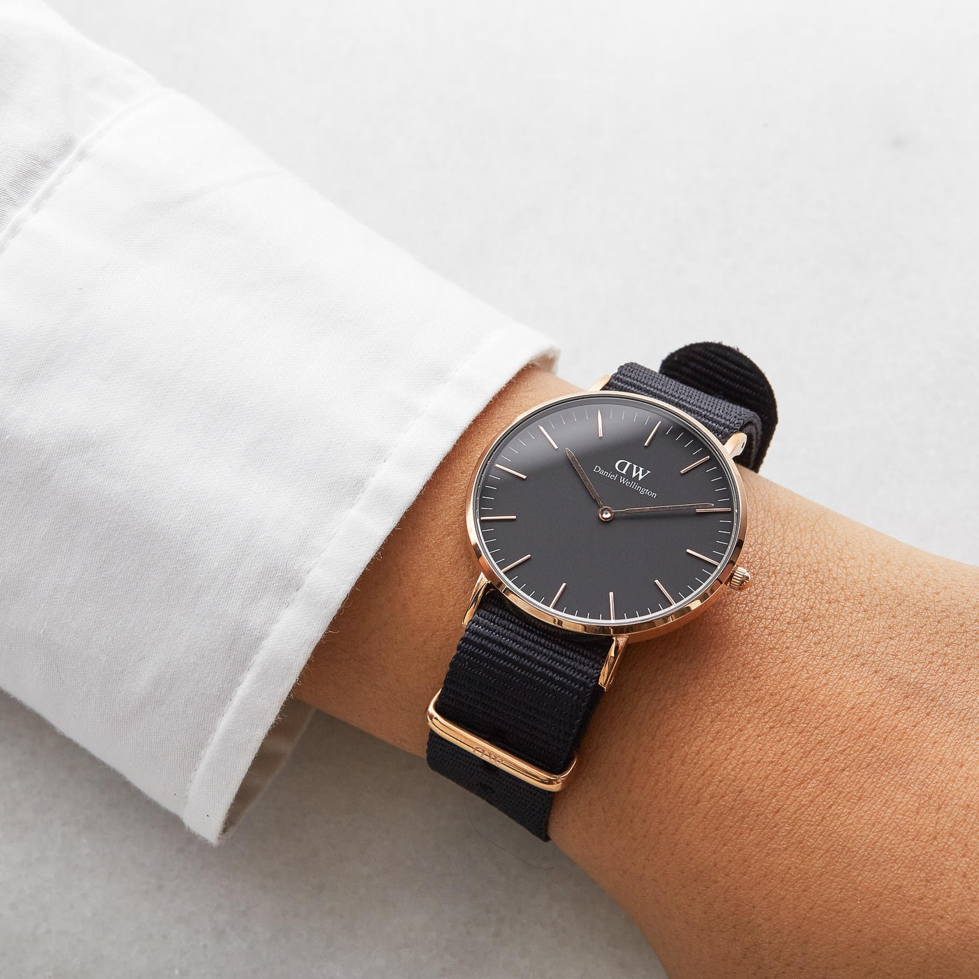 Daniel Wellington Cornwall 36mm watch worn on wrist with black NATO strap