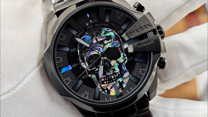 Close-up of Diesel Mega Chief DZ4582 dial showing rainbow-colored skull and chronograph subdials