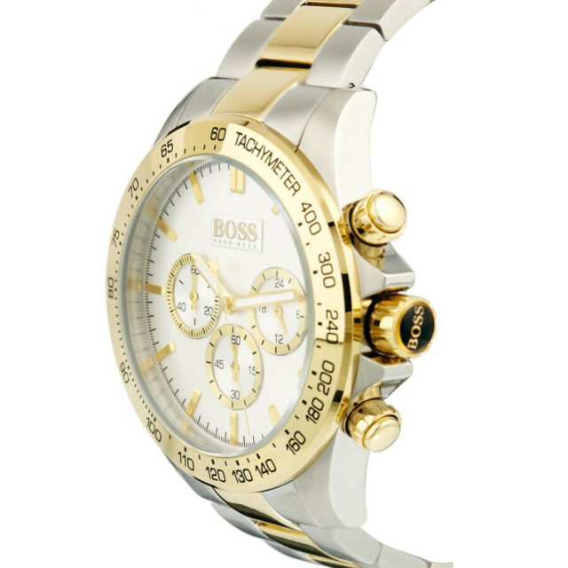 Side view of Hugo Boss chronograph showing gold pushers and two-tone bracelet