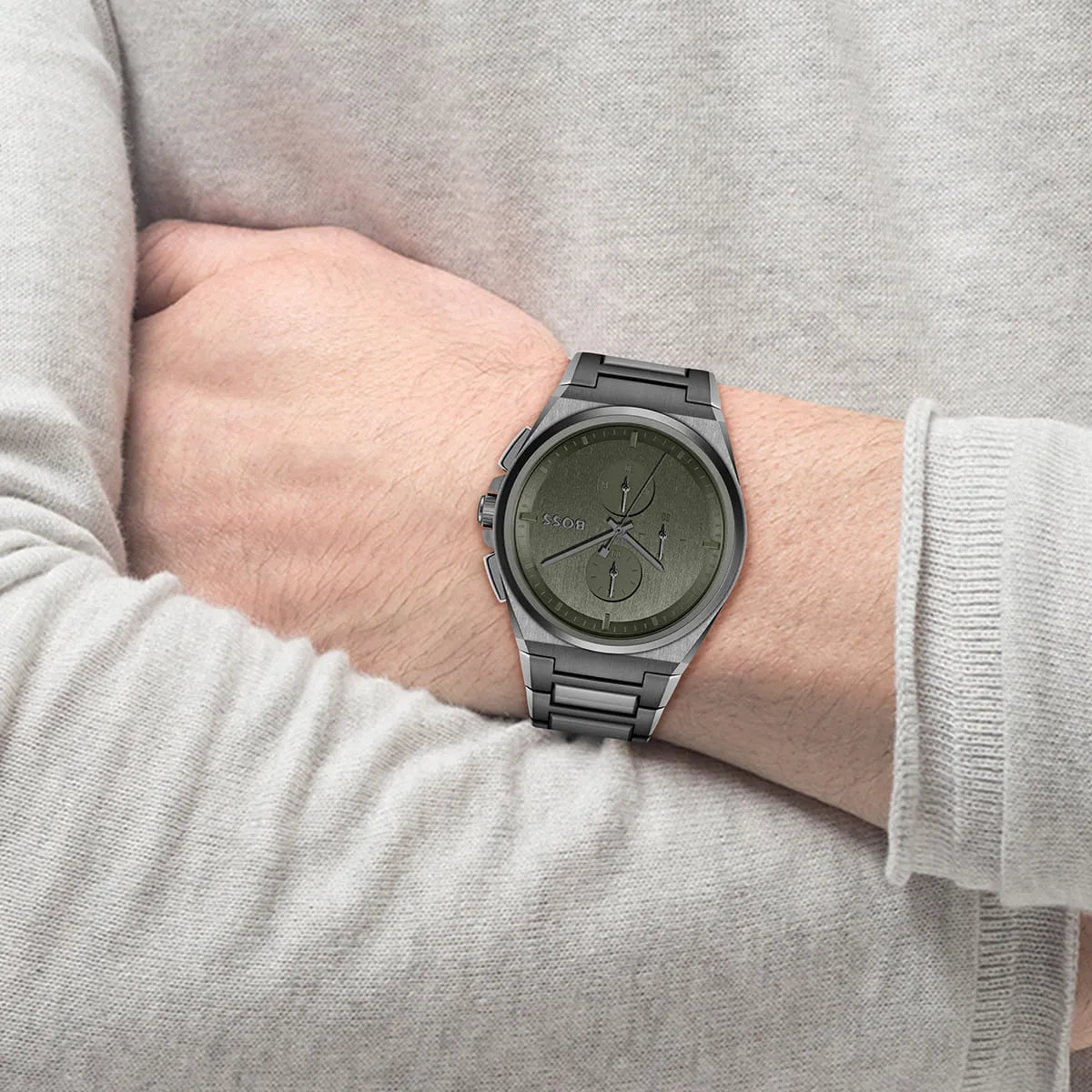 Hugo Boss Steer chronograph watch worn on wrist showing grey dial and steel bracelet