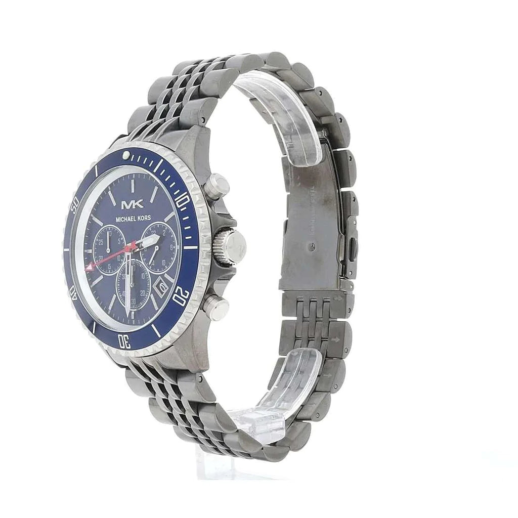 Angled view of Michael Kors Bayville chronograph with blue bezel and link bracelet