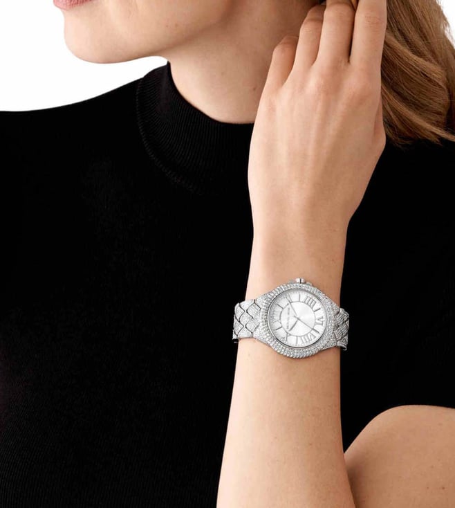 Michael Kors Camille Pavé silver women's watch worn on wrist with white dial visible