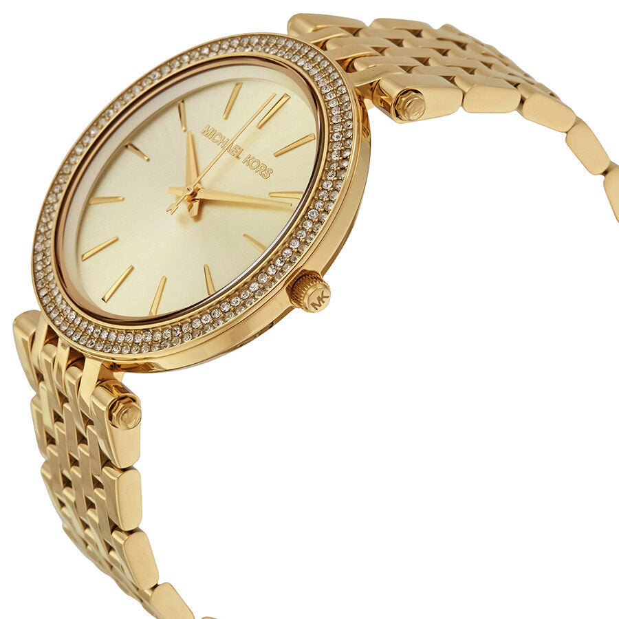 Michael Kors Darci Glitz watch side view showing gold case and bracelet with crystal bezel