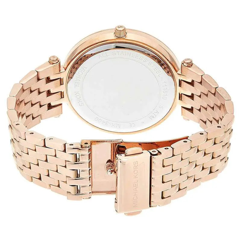 Michael Kors Darci MK3400 caseback showing rose gold-tone stainless steel with link bracelet