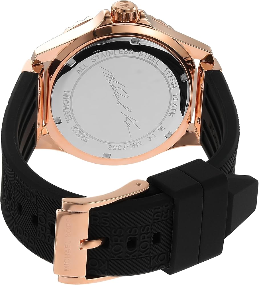 Michael Kors Everest watch caseback showing engraved text and stainless steel backing