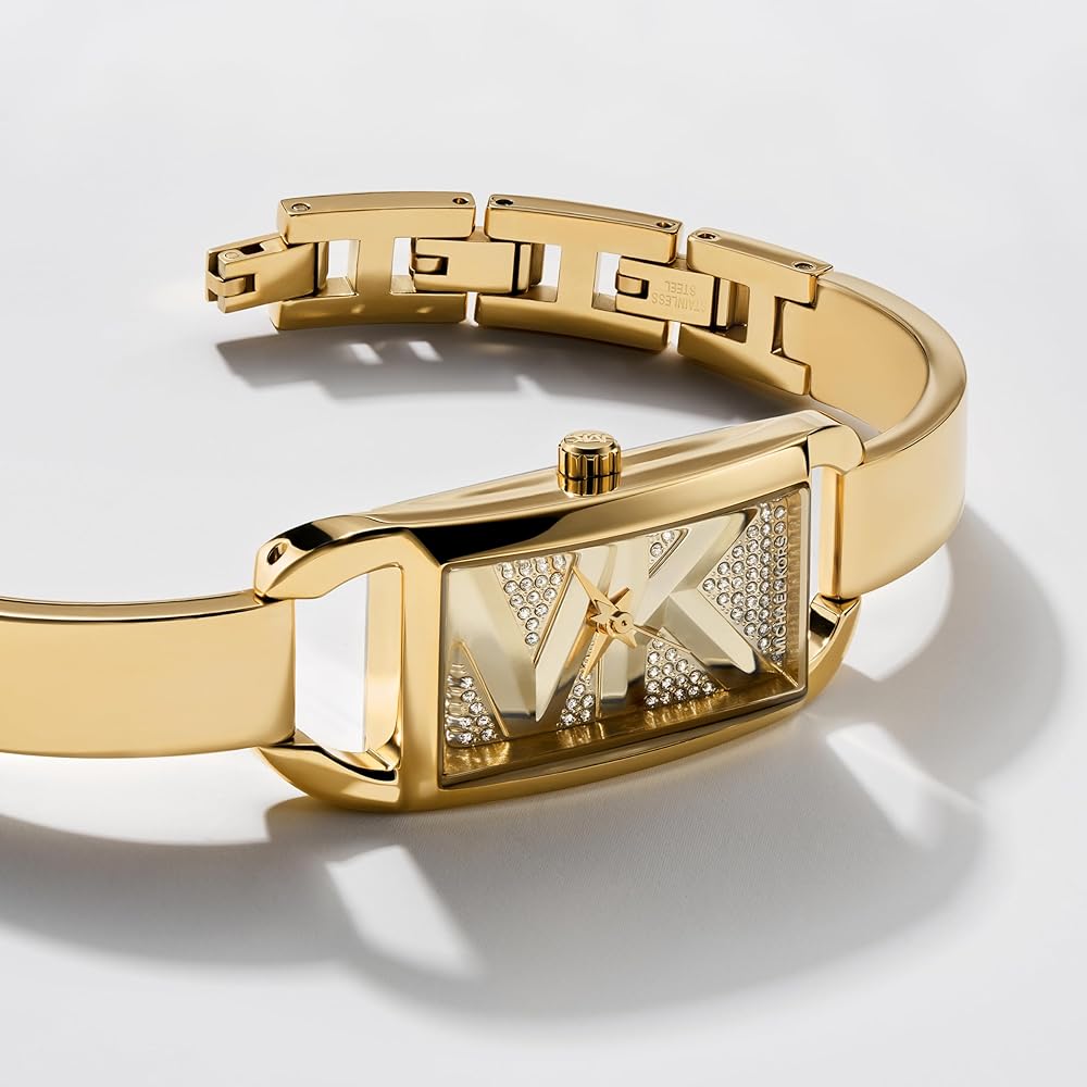Michael Kors MK4840 gold bangle watch shown at angle displaying case and bracelet construction