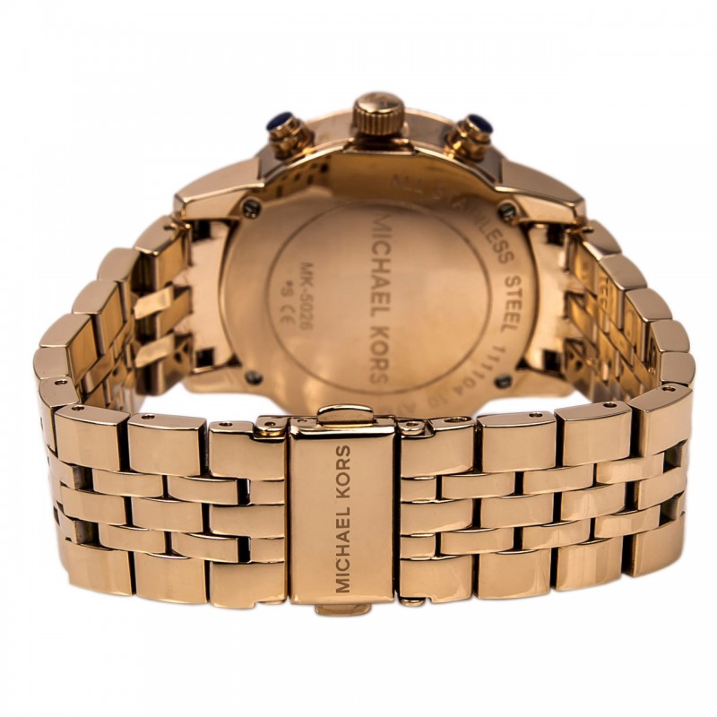 Michael Kors MK5026 caseback showing rose gold stainless steel with engraved branding
