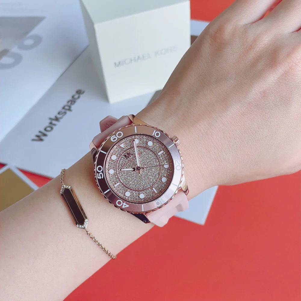 Michael Kors MK6854 Runway watch worn on wrist with pink strap