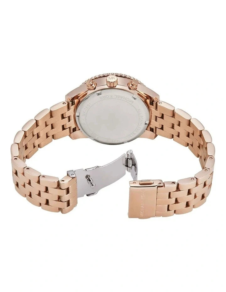 Caseback view of Mini Bryant rose-gold chronograph with link bracelet and fold-over clasp