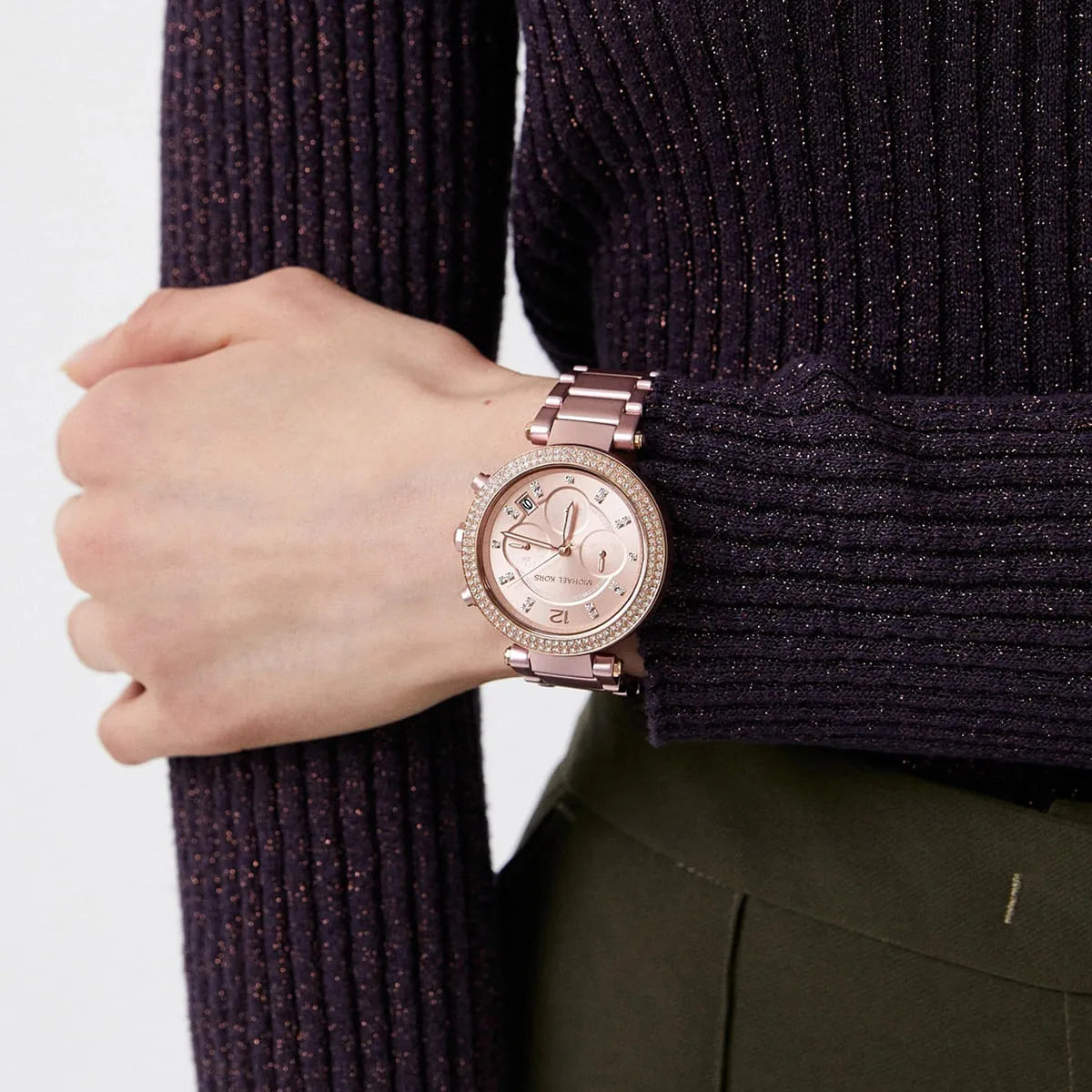 Michael Kors Parker pink chronograph watch worn on wrist