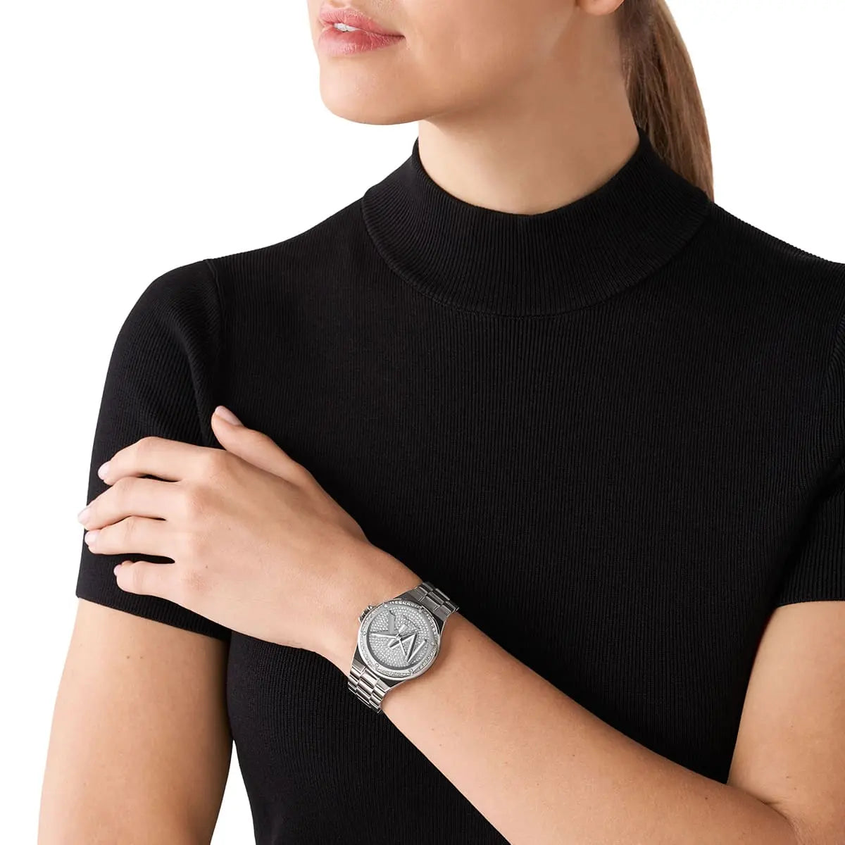 Michael Kors Lennox women's watch worn on wrist with silver-tone metal band
