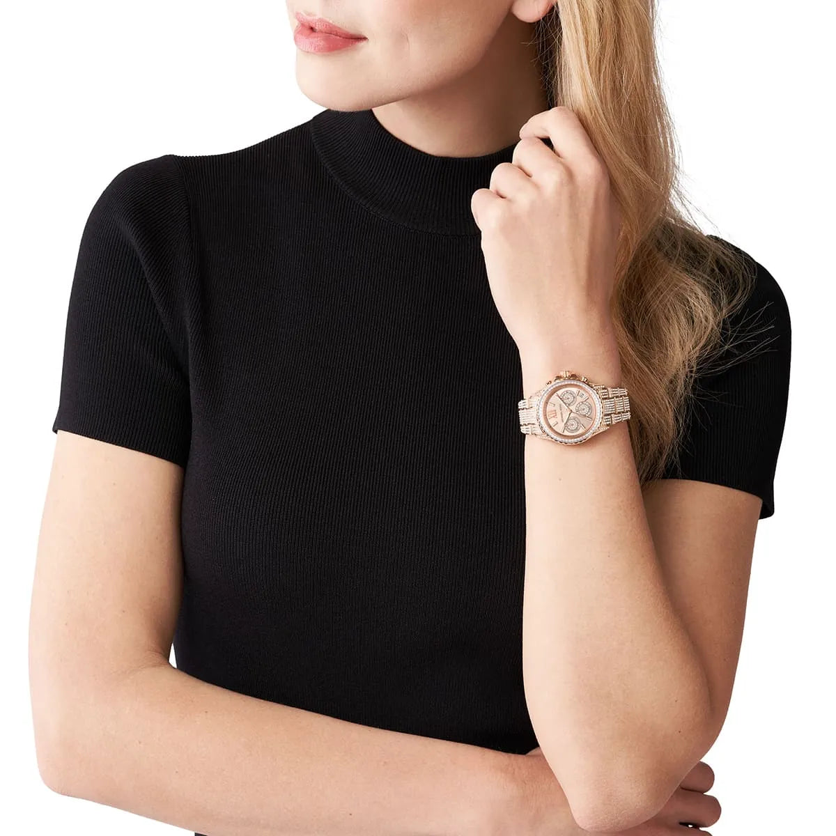 Michael Kors Everest chronograph watch worn on wrist with rose gold-tone crystal-embellished design