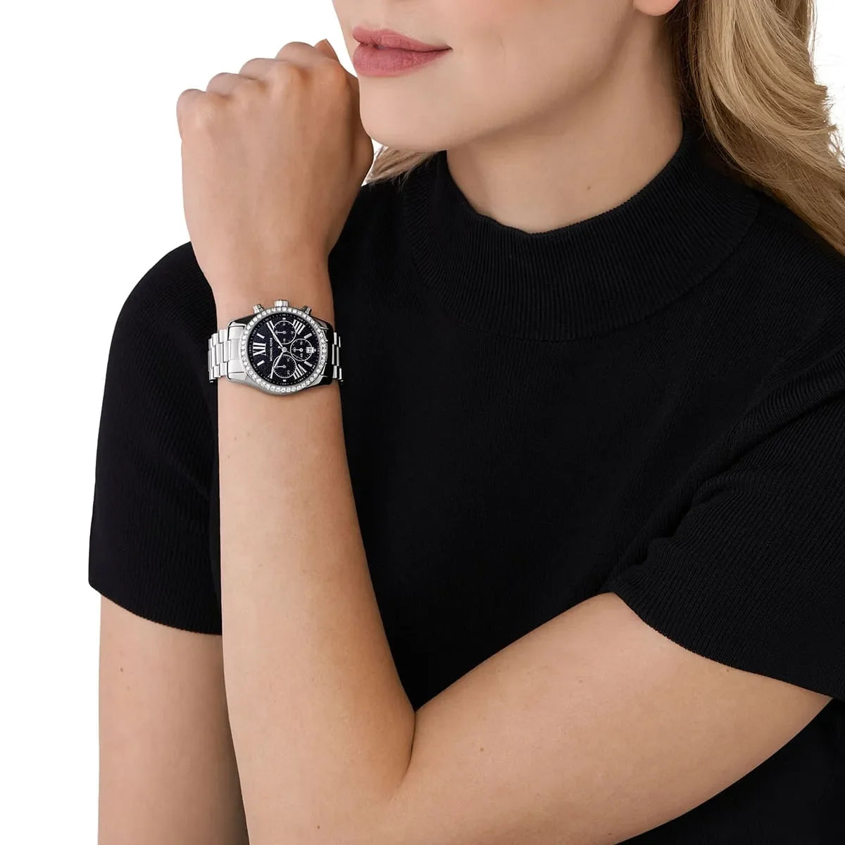 Michael Kors Lexington chronograph women's watch worn on wrist with black dial and crystal bezel