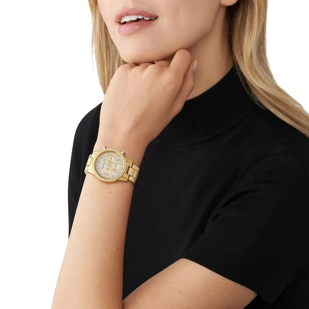 Michael Kors Ritz gold-tone chronograph watch worn on wrist with crystal-embellished dial