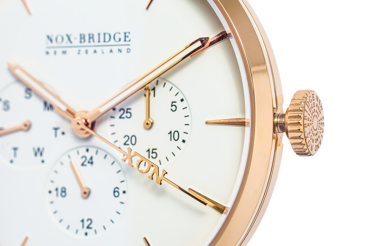 Close-up of Noxbridge Alcyone white dial with dual subdials and rose gold case detail