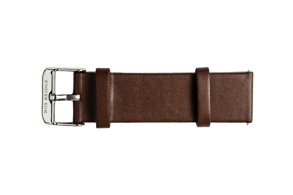 Dark brown waterproof vegan leather strap at angle showing buckle and stitching
