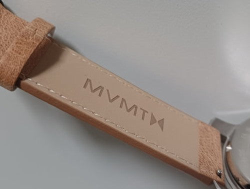 Fossil Grant brown leather strap with embossed MVMTM branding and adjustment holes