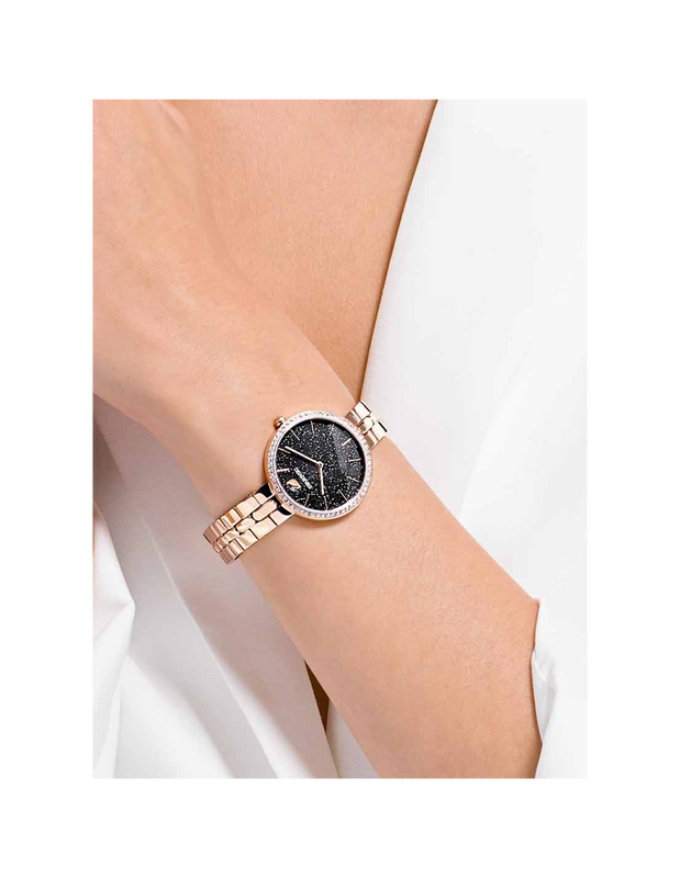 Swarovski Crystal Pave women's watch worn on wrist, rose gold tone