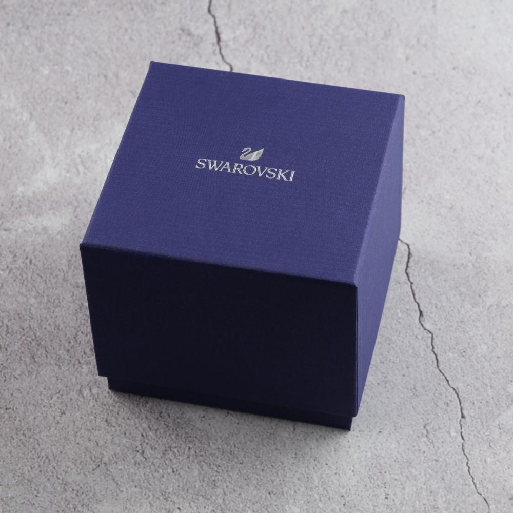 Swarovski watch packaging - blue branded box with logo
