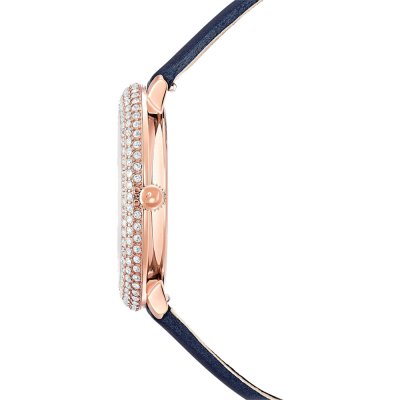 Side profile of Crystal Frost watch displaying rose-gold case and navy textile strap