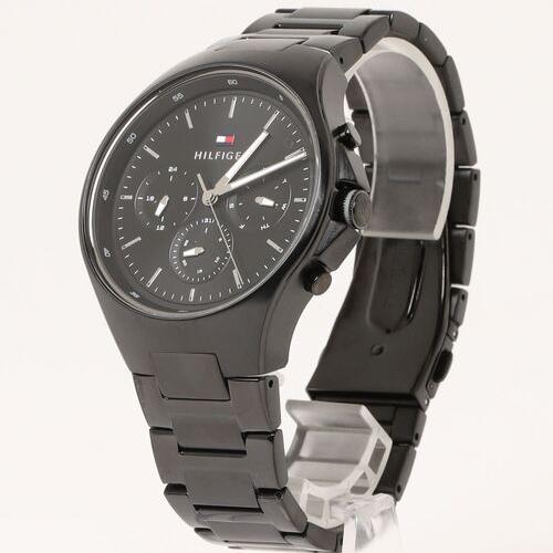 Tommy Hilfiger Justin black chronograph watch angled view with steel link bracelet